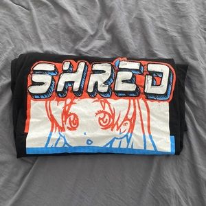 shred zumis shirt, cool anime shred! size large fits baggy. Very cool!!!